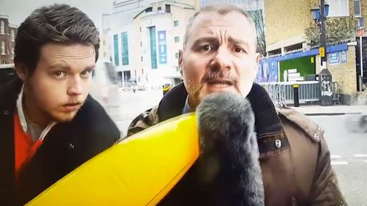 Italian TV reporter beats annoying fan with banana on transfer deadline day