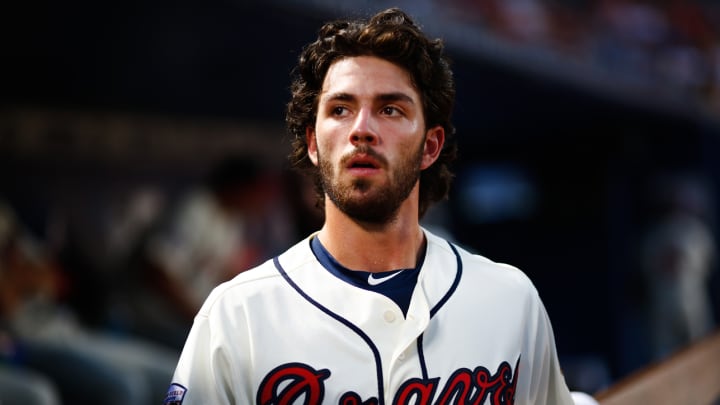 Dansby Swanson knocked out of game by errant throw back to pitcher