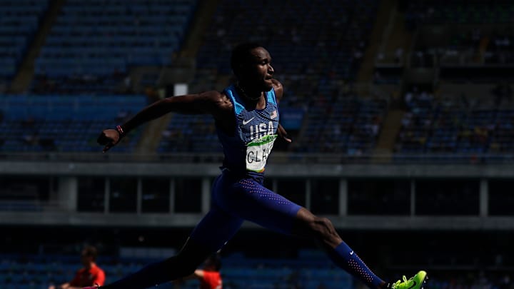 She said yes: Claye proposes after taking Olympic silver