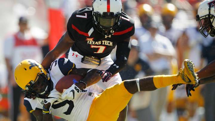 West Virginia's crazy grabs get Oklahoma State's attention