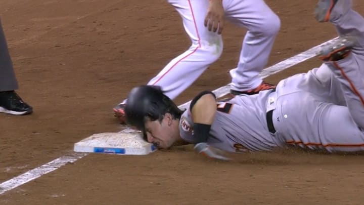 Buster Posey faceplants into third base Buster Posey faceplants into third base
