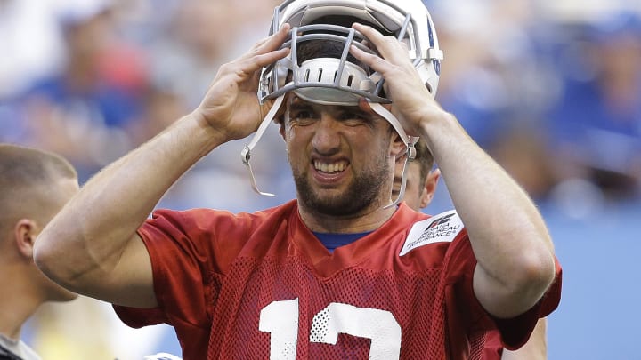 Luck keeps focus on football as contract talks continue