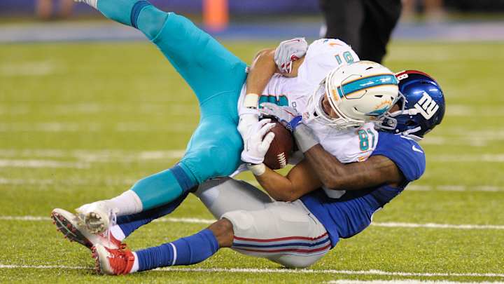 Nassib stumbles in start for Manning, Dolphins win 27-10