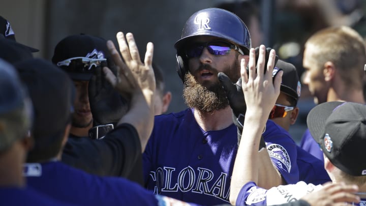 Cruz breaks out of slump as Mariners knock off Rockies 10-8