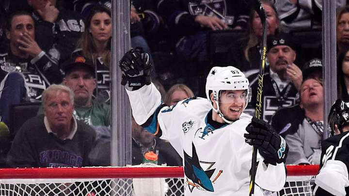 Sharks blow 3-goal lead, but rally to eliminate Kings 6-3