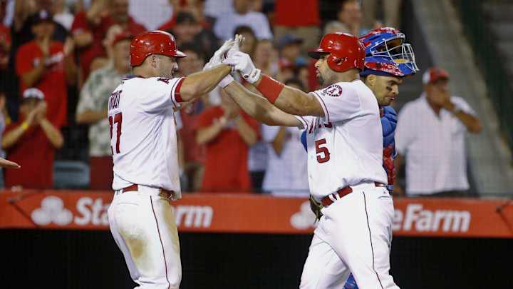 Pujols hits two 3-run HRs, streaking Angels beat Rangers 8-6