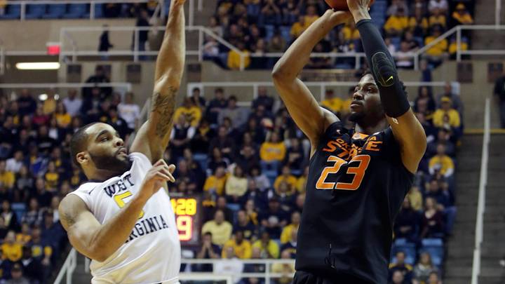 Holton, No. 17 West Virginia beat Oklahoma State 77-60 Holton, No. 17 West Virginia beat Oklahoma State 77-60