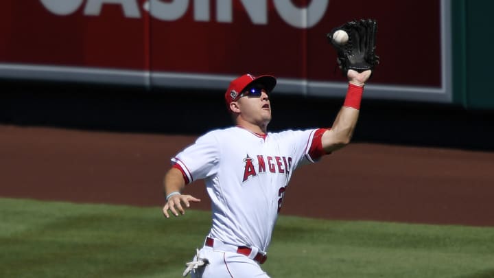 Simmons hits 2 home runs, lifts Weaver, Angels over Rangers Simmons hits 2 home runs, lifts Weaver, Angels over Rangers