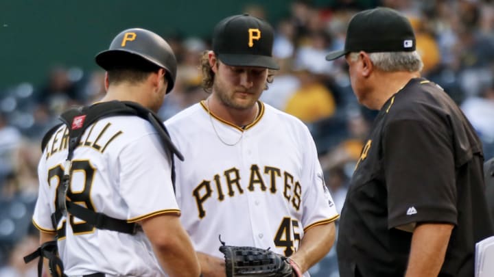 Pirates' Cole, Cervelli leave game with injuries