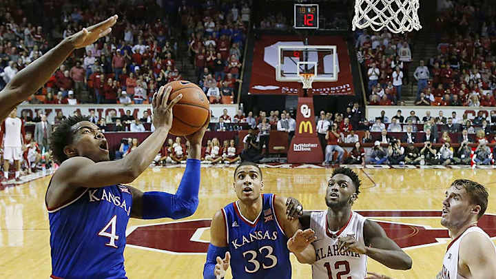 Kansas’s Devonte’ Graham pulls off master act in win over Oklahoma