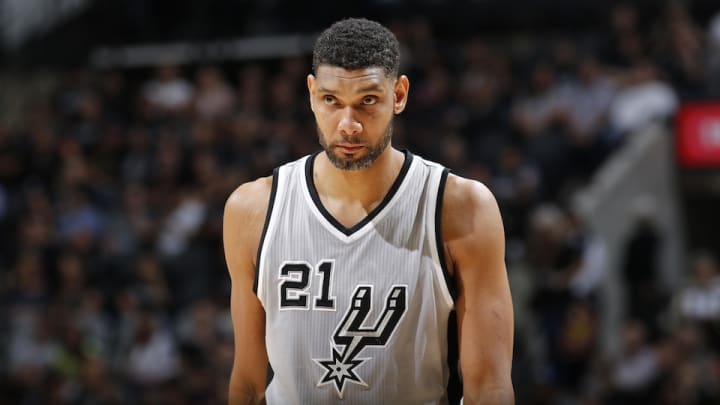 Report: Tim Duncan exercises player option, future still unclear Report: Tim Duncan exercises player option, future still unclear