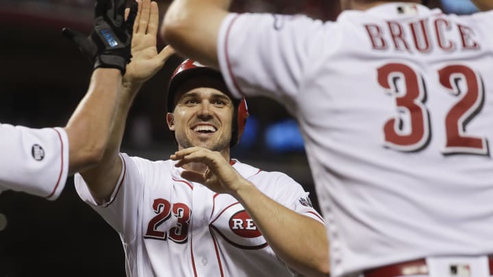 Doubles by Duvall, Barnhart rally Reds over Brewers 5-4