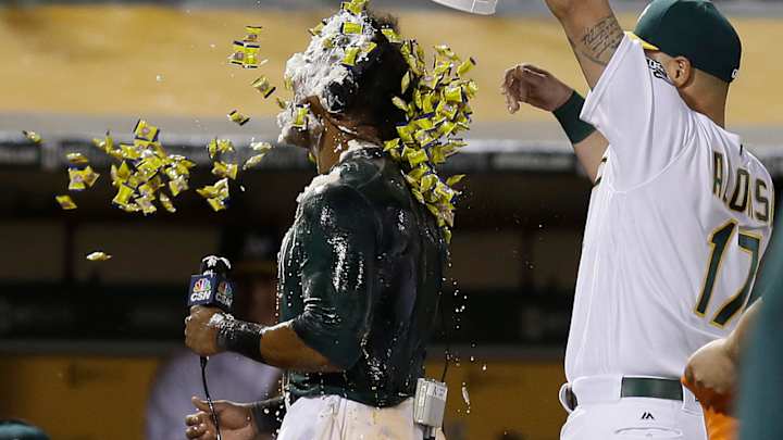 Davis hits 3 HRs, beats Rangers with slam in A's 8-5 victory