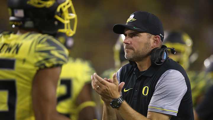 Prukop passes for 3 TDs and Ducks beat Virginia 44-26