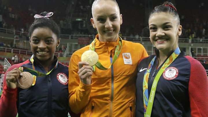 Biles' run at history ends with bronze in beam finals