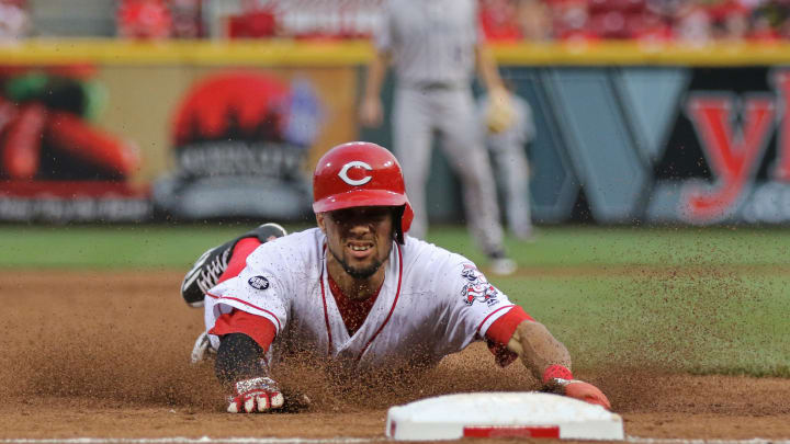 Reds swipe 5 bases in an inning, hold on to beat Rockies 4-3 Reds swipe 5 bases in an inning, hold on to beat Rockies 4-3