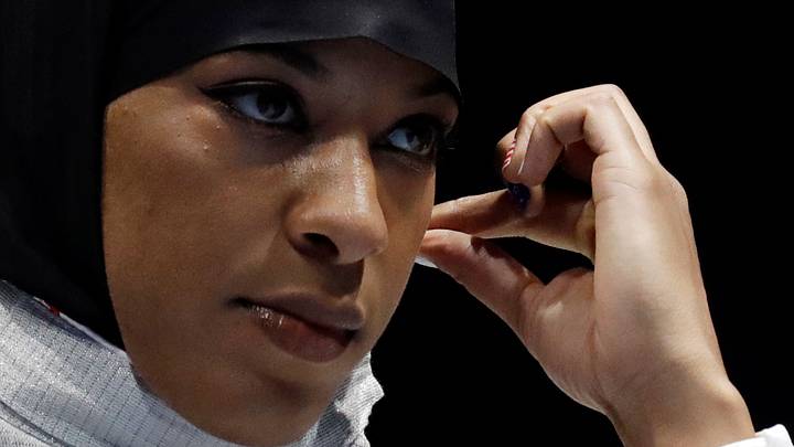 Muhammad first US athlete to wear hijab at an Olympics Muhammad first US athlete to wear hijab at an Olympics