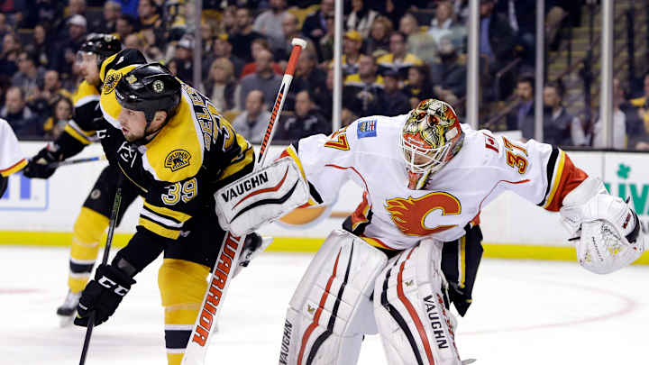 Late goal by Bergeron gives Bruins 2-1 win over Flames Late goal by Bergeron gives Bruins 2-1 win over Flames