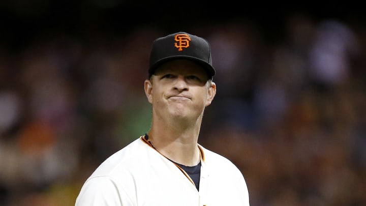 Cain hits better than he pitches as Giants beat Reds 9-7