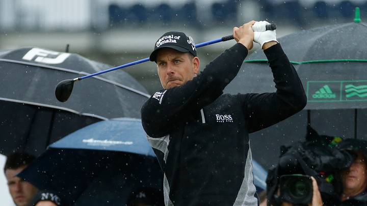 Lefty on top: Mickelson maintains lead on rainy day at Troon