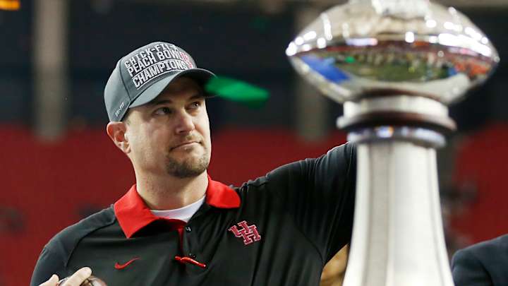 AP Source: Houston's Herman leaving for Texas