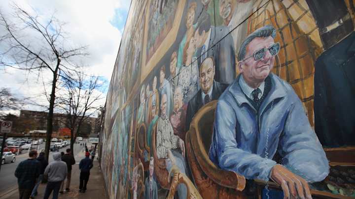 Muralist repaints halo above former Penn State coach Joe Paterno