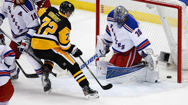 Rangers’ Lundqvist leaves game after taking stick to the eye