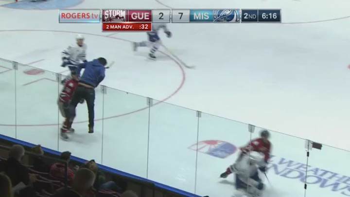Watch: Idiot hockey fan climbs onto the ice, immediately slips and falls