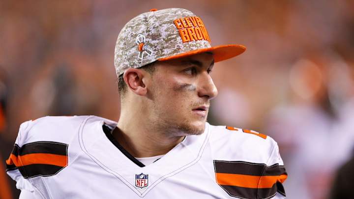 Report: Johnny Manziel turns himself in for domestic violence charge