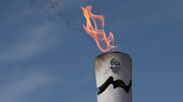 Man arrested after throwing water on Olympic flame