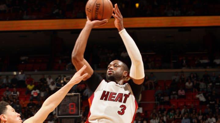 Wade scores 27 points, Heat ease past Suns 108-92