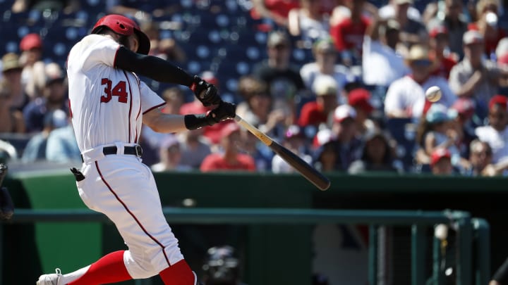 Blackmon homers twice as Rockies beat Nats 9-4 in 11 innings