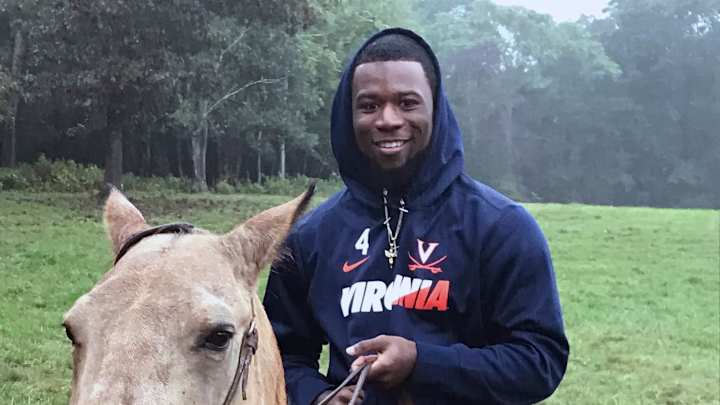 Team bonding: Virginia's Mendenhall hosts team at his ranch