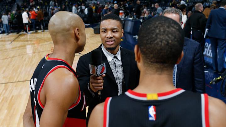 Watch an injured Damian Lillard conduct a post-game interview