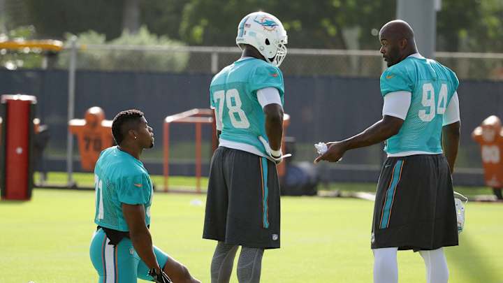 Dolphins counting on deep, experienced front 4