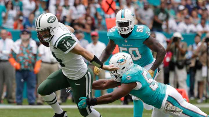 The Latest: Cowboys' Bryant active, looks ready to play