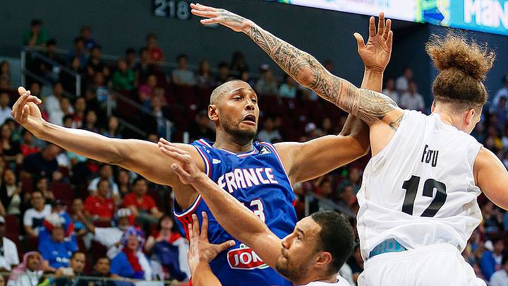 France pulls within two wins of berth in Olympic basketball tournament France pulls within two wins of berth in Olympic basketball tournament