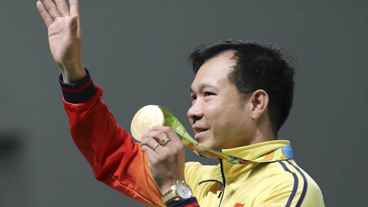 Hoang holds on against Wu, rowdy crowd to take air gun gold