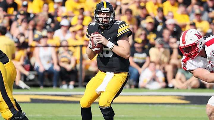 Raised on football and country music, quarterback C.J. Beathard striking a chord at Iowa