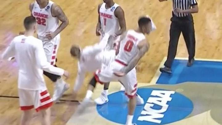 Poor Syracuse walk-on gets knocked to the floor on a shoulder bump