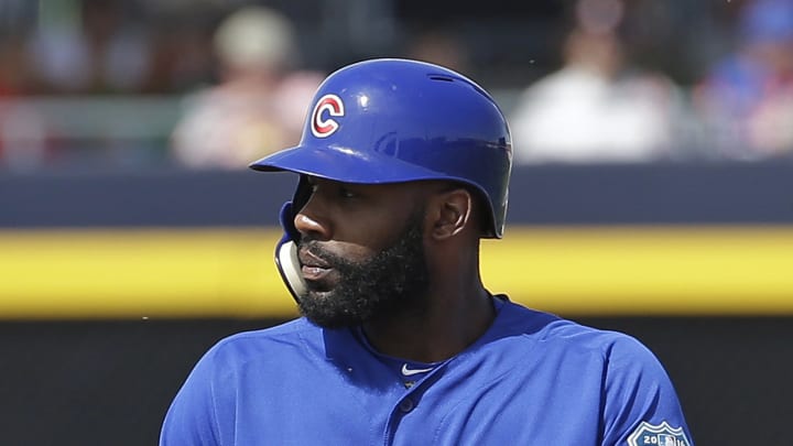 Heyward climbs fence to avoid bees, swarm halts M's-Cubs