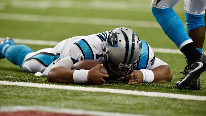 Newton's slow drive to the end zone cost him a concussion