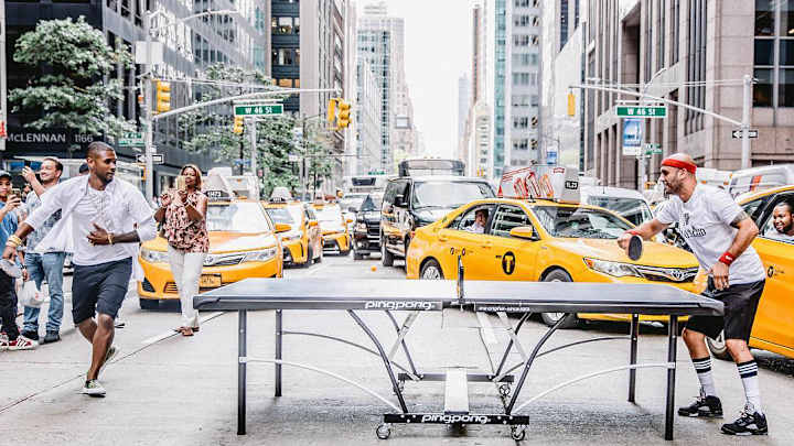 Usher played ping pong in the middle of a busy Manhattan street