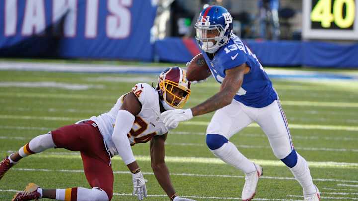 Under-fire Cousins helps Redskins beat Giants for first win