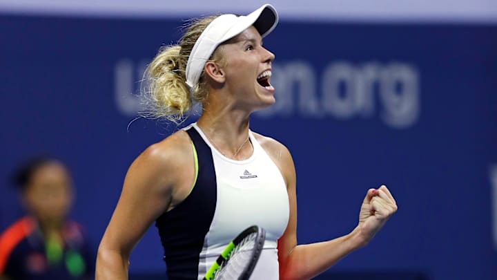 Wozniacki gets past injured Sevastova to reach US Open SF Wozniacki gets past injured Sevastova to reach US Open SF