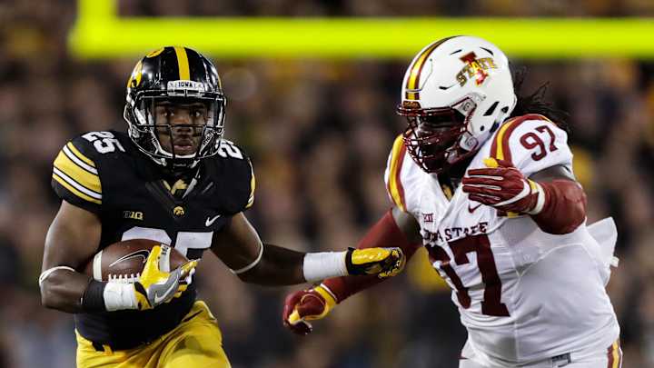No. 16 Iowa throttles Iowa State 42-3 No. 16 Iowa throttles Iowa State 42-3