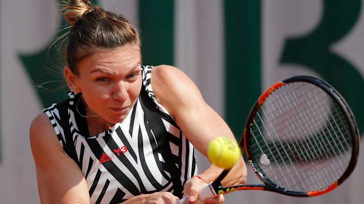 The Latest: Simona Halep in trouble against Osaka