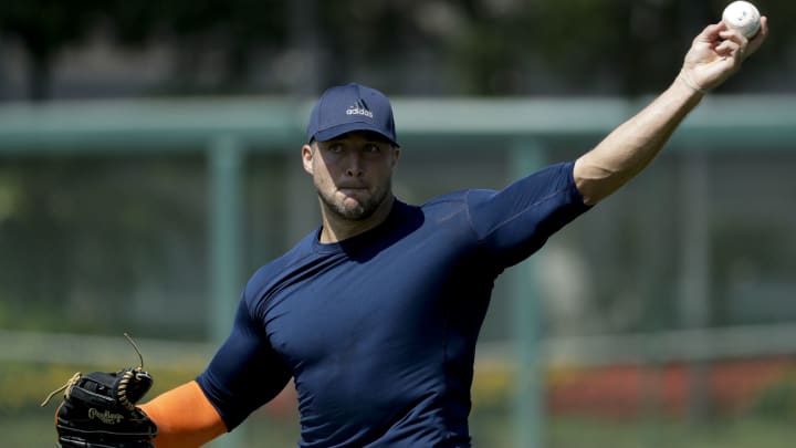 Tim Tebow shows solid power, shaky skills in MLB workout Tim Tebow shows solid power, shaky skills in MLB workout