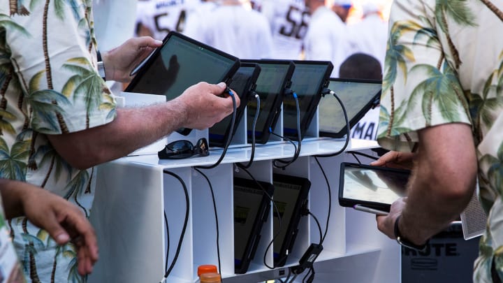 College football delays in-game technology implementation again