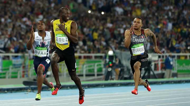 Usain Bolt's mid-race smile celebrated by meme makers Usain Bolt's mid-race smile celebrated by meme makers